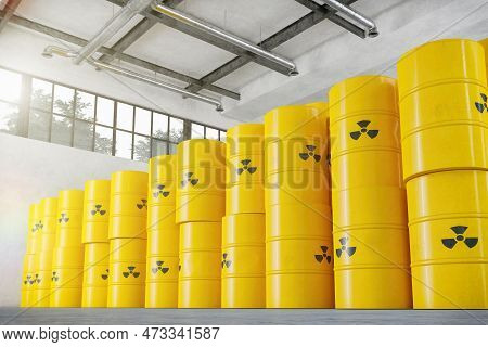 3d Render Of A Warehouse With Many Atom Barrels