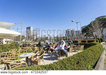 Tirana, Albania. March 2023.   Some People Sitting In The Bars At The Park Rinia 