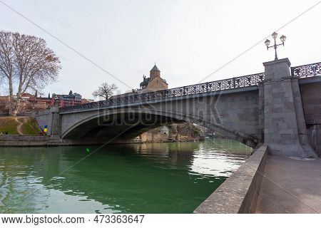 Tbilisi, Georgia - 18 February, 2023: Church Of Metekhi And The Metekhi Bridge Over The Kura, Mtkvar