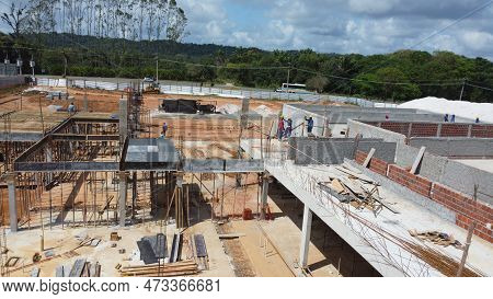 Ilheus, Bahia, Brazil - October 7, 2022: Workers During Construction Of A Polyclinic Of The Estada D