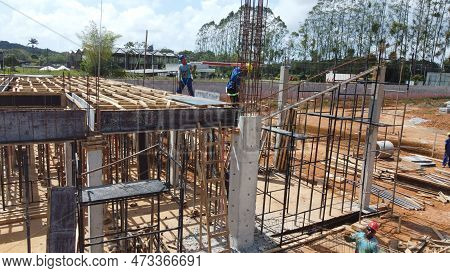 Ilheus, Bahia, Brazil - October 7, 2022: Workers During Construction Of A Polyclinic Of The Estada D