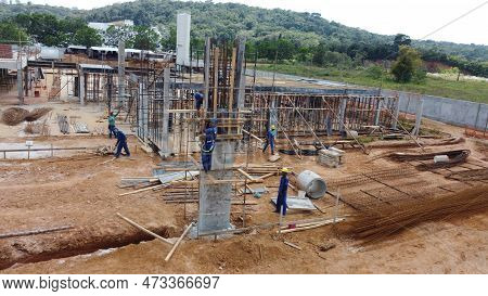 Ilheus, Bahia, Brazil - October 7, 2022: Workers During Construction Of A Polyclinic Of The Estada D