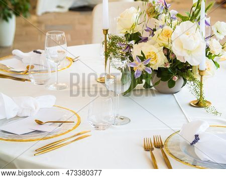 Wedding Banquet Concept. Chairs And Round Table For Guests, Served With Cutler And, Flowers And Croc