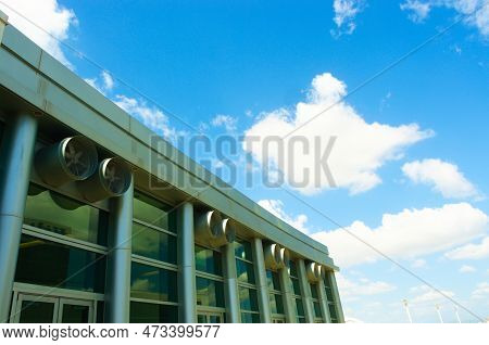 Composition Of Blue Sky White Clouds Metal Turbines