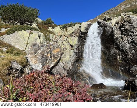 Mountain Waterfalls And Cascades Of Alpine Stream Ova Da Radönt (ova Da Radoent) Above The Swiss Roa