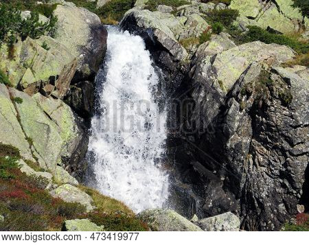 Mountain Waterfalls And Cascades Of Alpine Stream Ova Da Radönt (ova Da Radoent) Above The Swiss Roa