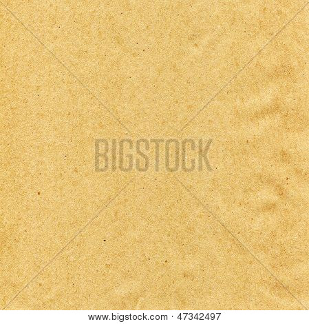 Carta Kraft sabbia con macchiettature marrone.