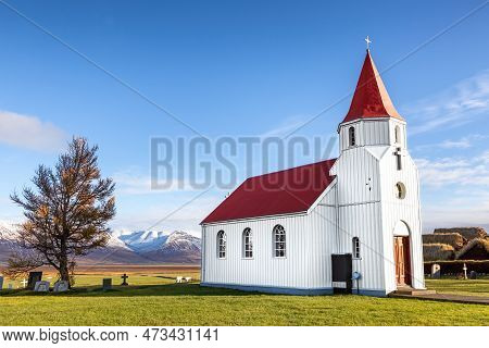 Glaumbaejarkirkja , The Glaumbaer Church, In Northern Iceland. Traditional Red And White Building Wi