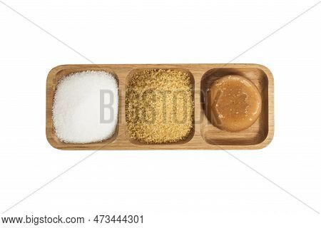 White Sugar, Brown Sugar And Sugar Cane Panela On White Background