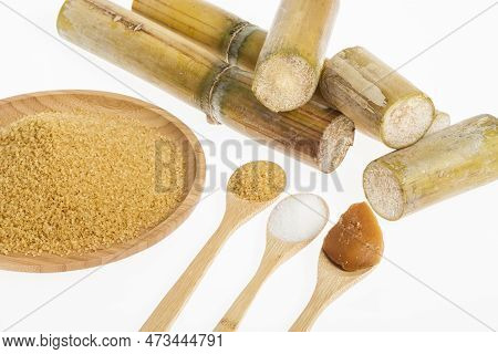 White Sugar, Brown Sugar And Sugar Cane Panela On White Background
