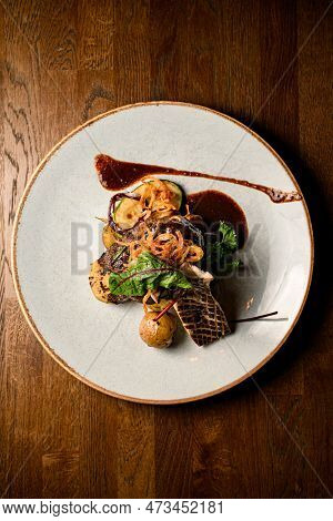 Top View On Plate With Slice Of Grilled King Oyster Mushroom And Piece Of Fried Meat With Potatoes