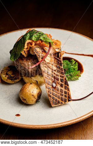 Beautiful View Of Slice Of Grilled King Oyster Mushroom And Piece Of Fried Meat With Potatoes