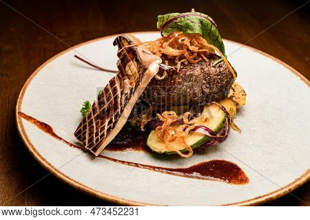 Close-up Of Delicious Dish With Slice Of Grilled King Oyster Mushroom And Piece Of Fried Meat With P
