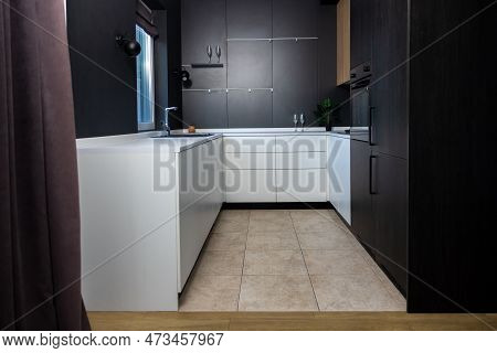 Cozy Kitchenette With A Gas Stove And A Sink