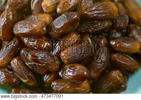 Dates. Dried Date Palm Fruits. Healthy Sweet Snack Food Pile Of Tasty Dry Dattes. Date Harvest Symbo