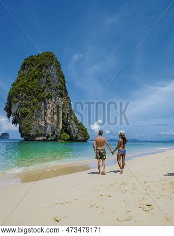 Railay Beach Krabi Thailand, Tropical Beach Of Railay Krabi, Couple Men And Woman On The Beach, Pano