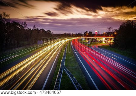 Oldenzaal, Netherlands - March 24, 2023: Long Exposure Shot Of Traffic On The E30 Highway From Amste