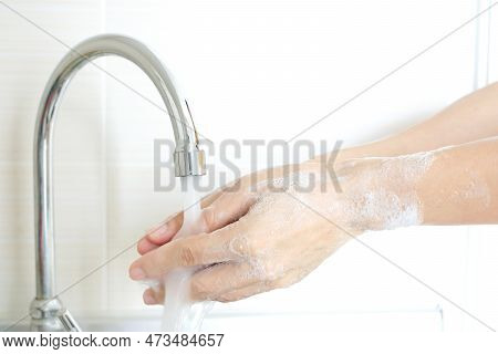 Hand Of Beauty Woman  Wash Your Hands At The Wash Basin With Foam, Cleanse The Skin And Have Water F