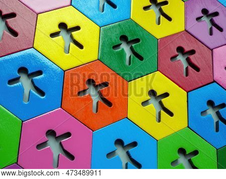 Multi-colored Figures On Hexagonal Plates. Allyship Concept.