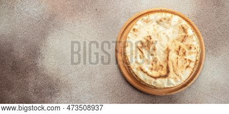 Pita Bread On A Wooden Board. Traditional Arabic Cuisine. Long Banner Format. Top View.