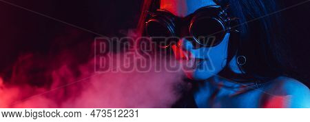 Hookah Atmosphere. The Girl Enjoys Smoking A Hookah, Sheesha. Surrealism. Horizontal Wide Photo Subt