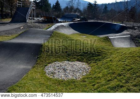 Bike Path In The Car Park Pumping (moving Up And Down) Is Used Instead Of Pedaling And Bouncing To M