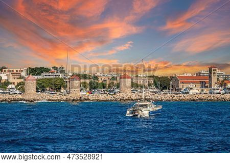 Rhodes, Greece - July 3, 2022: Panoramic View Of The Medieval Town Of Rhodes And Its Mandraki Harbou