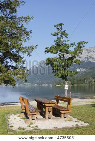 Old bench in mountains panorama
