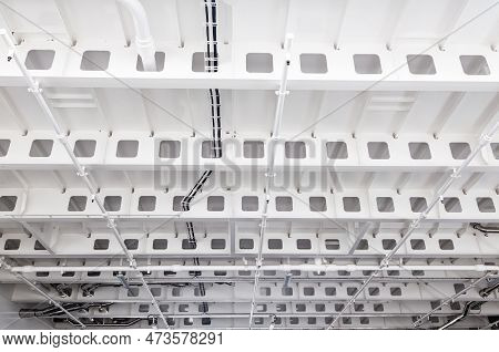 White Painted Steel Ceiling On The Vessel With Stiffeners, Piping And Electrical Wiring On The Ceili