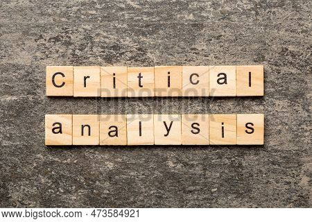 Critical Analysis Content Word Written On Wood Block. Critical Analysis Content Text On Table, Conce