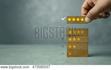 Feedback Rating And Positive Customer Review Experience. Customer Are Choosing Wood Block With Five 