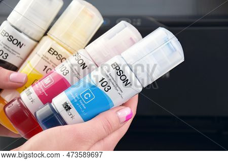 Four Bottles Of Ink Epson, Yellow, Red, Blue, Black, Built-in To The Epson L3150 Series Printer.