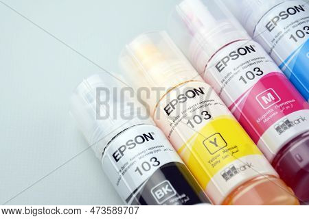Four Bottles Of Ink Epson, Yellow, Red, Blue, Black, Built-in To The Epson L3150 Series Printer.