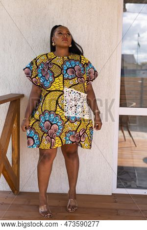 Portrait Of Beautiful African American Woman Having Fun On Village Or Suburbian. Outdoor Cottagecore