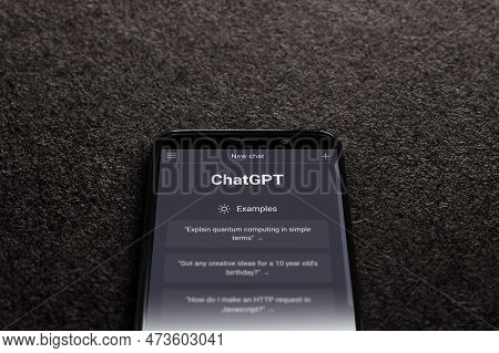 Website Of Chatgpt On Screen Smartphone On Black Textured Background. Chatgpt Is A Chatbot By Openai