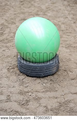 Plastic Physioball On The Sand During Training For Beginner Riders And Horses At Riding School Indoo