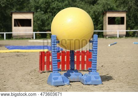 Plastic Physioball On The Sand During Training For Beginner Riders And Horses At Riding School Indoo