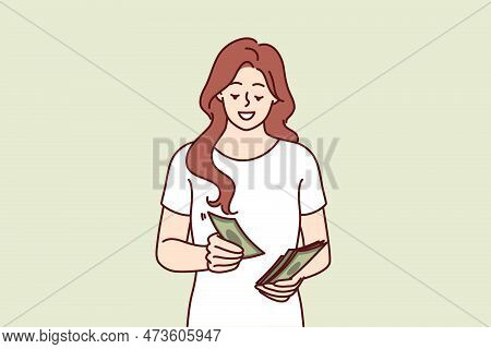 Successful Woman Counts Money Earned In Business Or Received From Dividend Investments With Good Pro