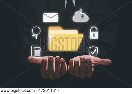 Document Management System Dms, Businessman Holding Folder And Document Icon On Virtual Screen, Virt