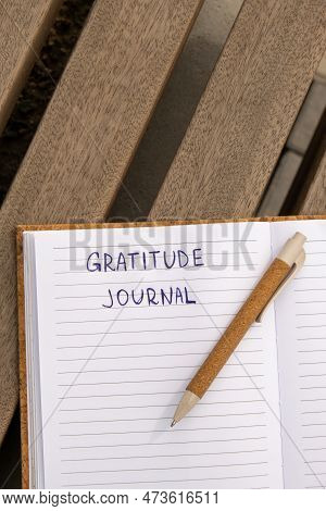 Writing Gratitude Journal On Wooden Bench. Today I Am Grateful For. Self Discovery Journal, Self Ref