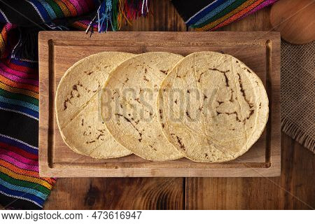 Corn Tortillas. Food Made With Nixtamalized Corn, A Staple Food In Several American Countries, An Es