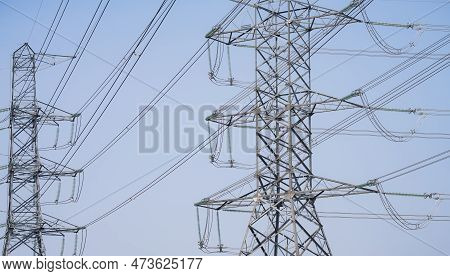 High Voltage Electric Transmission Tower. High Voltage Power Lines Against The Sky. Electricity Pylo