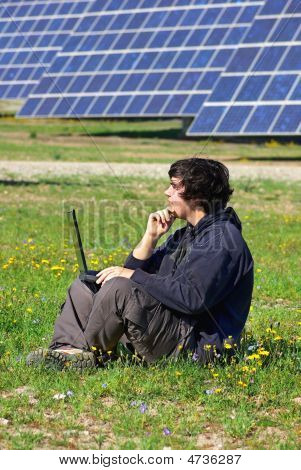 Young Man In Central Of Photovoltaic.
