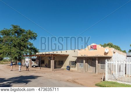 Kanoneiland, South Africa - Feb 25, 2023: A Supermarket In Kanoneiland Near Upington. People Are Vis