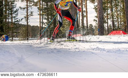 Zlatoust, Russia - March 17 2019: Skier Athlete Running Uphill In Cross-country Skiing, Fischer Raci