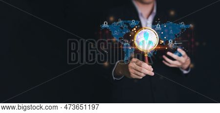 Businessman Use Magnifying Glass For Crm, Customer Relationship Management. Hr, Human Resource Searc