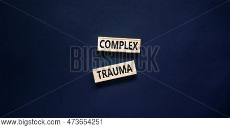 Complex Trauma Symbol. Concept Words Complex Trauma On Wooden Block. Beautiful Black Table Black Bac