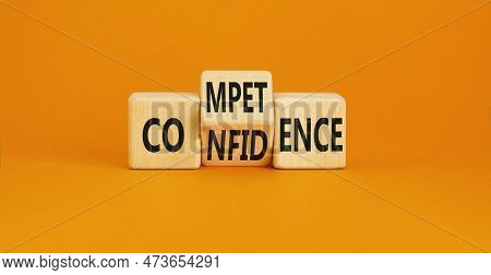 Competence And Confidence Symbol. Concept Word Competence Confidence On Wooden Cubes. Beautiful Oran