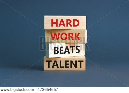 Hard Work Beats Talent Symbol. Concept Words Hard Work Beats Talent On Woodenblock. Beautiful Grey T