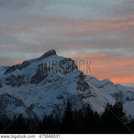 Pink Clouds Over Snow Covered Mount Schluchhore.